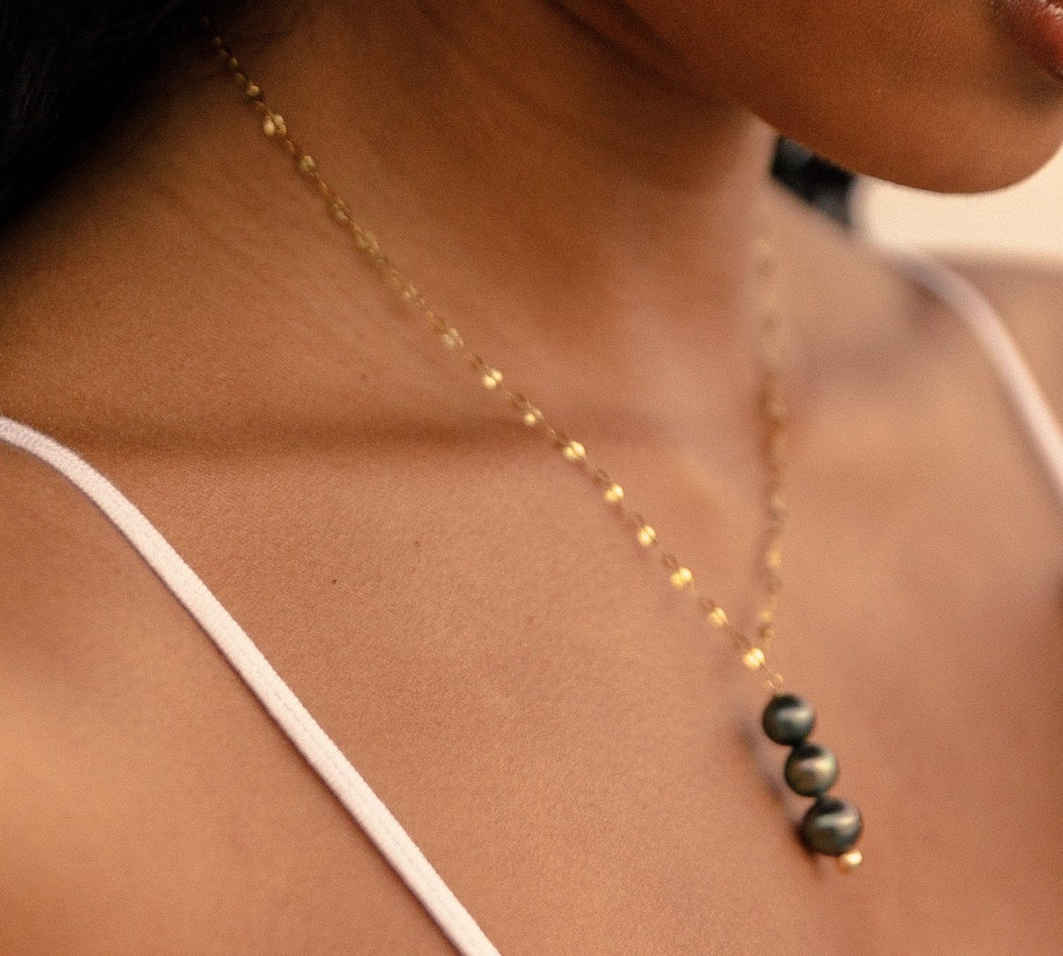 Girl wearing necklace